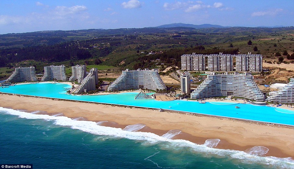 Enough to make your head swim World's largest pool which cost $1bn and holds 66m gallons is so big you can even sail boats on it