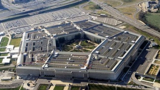 Obama signs $633-billion military bill despite earlier threat of vetoing it