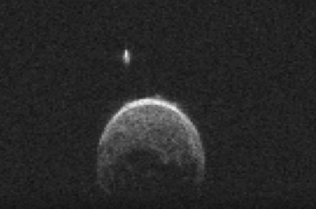 Strange: Is this object orbiting an asteroid a space ship? UFO
