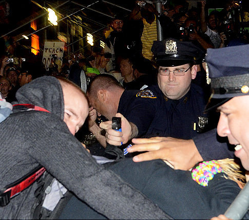 Protestors from an anti-Wall Street march are arrested and pepper sprayed as they tried to march to Wall Street Wednesday night. Protestors from an anti-Wall Street march are arrested and pepper sprayed as they tried to march to Wall Street Wednesday night.