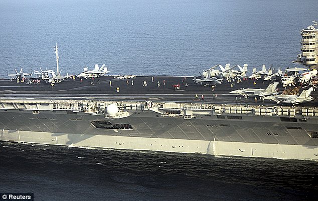 Escalating: Tensions between the two countries are escalating on an almost daily basis over Iran's ongoing 10-day navy drill near the strategic Strait of Hormuz