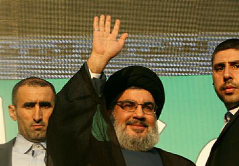 File - Hezbollah leader Sayyed Hasan Nasrallah waves to the crowd in Beirut, on Monday, Sept. 17, 2012. (The Daily Star/Hasan Shaaban)
