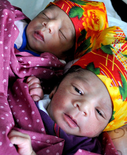 Like these newly born twins, more children are born daily into families who can barely afford to raise a child. Credit: Zofeen Ebrahim/IPS