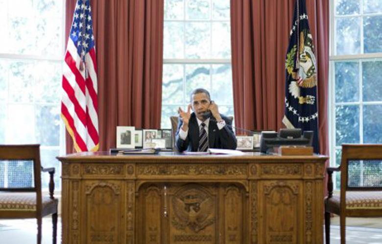 US President Barack Obama speaks on the phone with Israel's Prime Minister Benjamin Netanyahu, in the Oval Office in this September 28, 2012 White House handout photograph. (Photo: Reuters - Pete Souza - The White House handout)