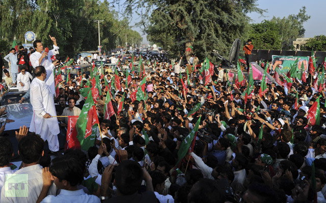 Imran Khan, cricketer-turned-politician and head of Pakistan Tehreek-e-Insaf (PTI), is speaks to supporters as he leads a peace march against U.S. drone strikes from Islamabad to South Waziristan, in Mianwali October 6, 2012. (Reuters/Ahsan Baloch)